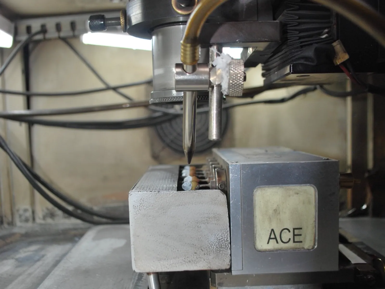 Diamonds mounted beneath a laser sawing head